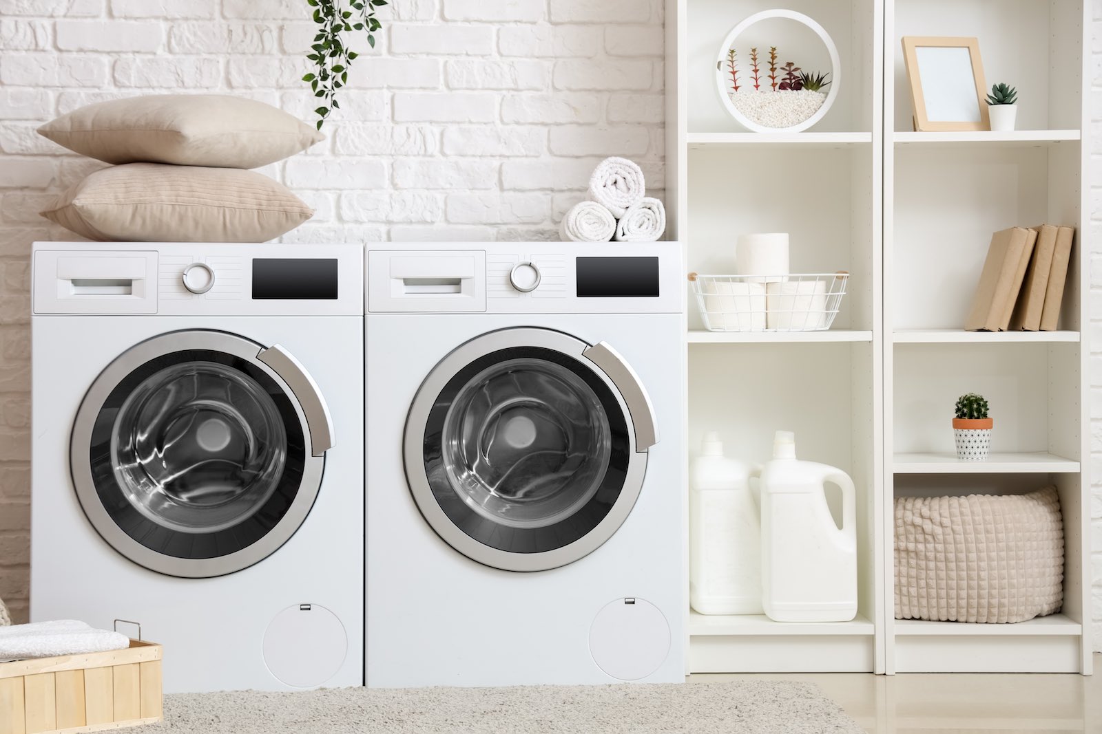Pillows drying with dryer balls to help separate the fill
