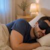 Adult sleeping with a black 3D memory foam sleep mask